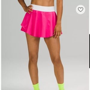 Court rival high rise skirt sonic pink